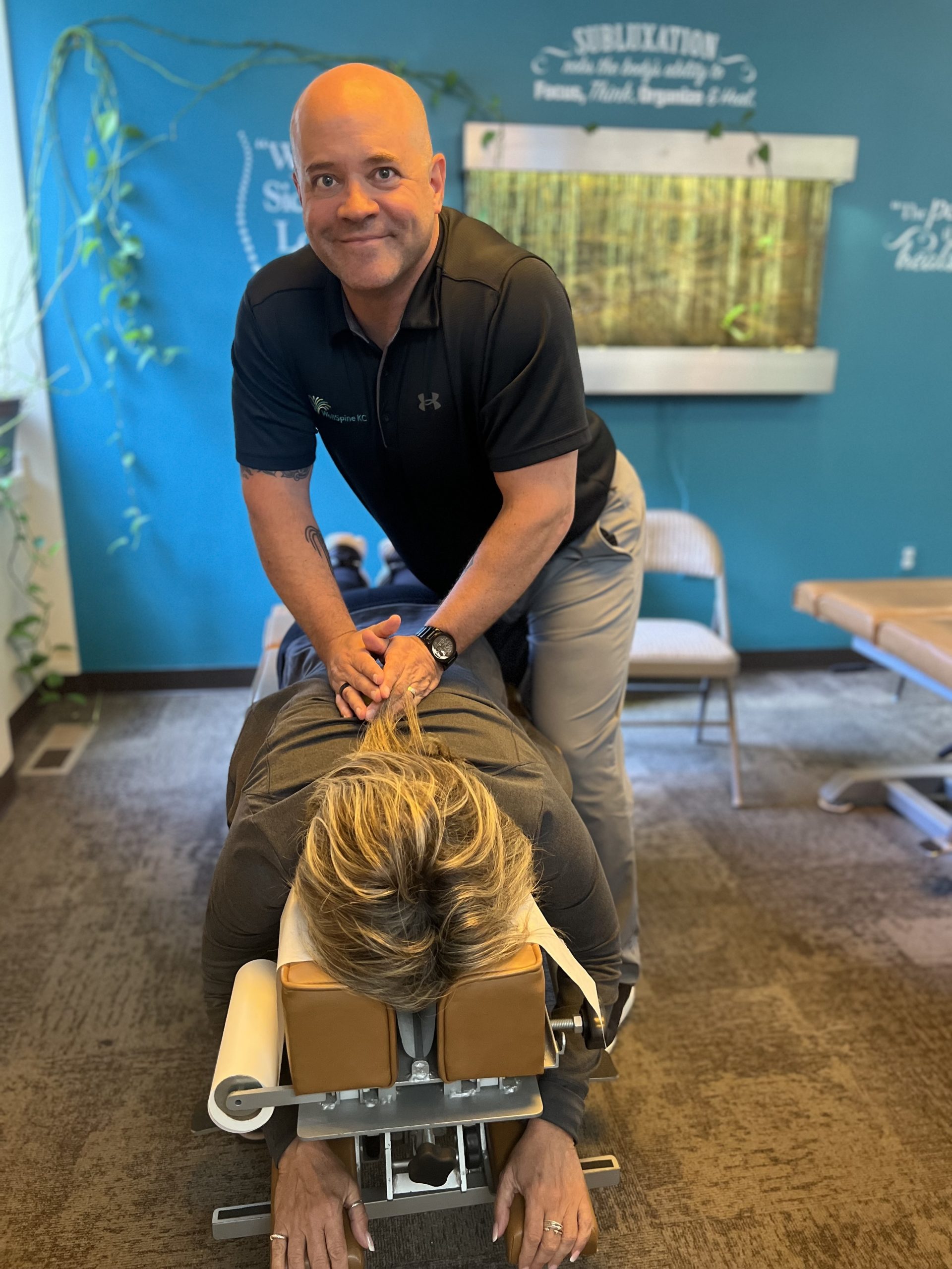 Dr. Andrew Hall adjusting a patient